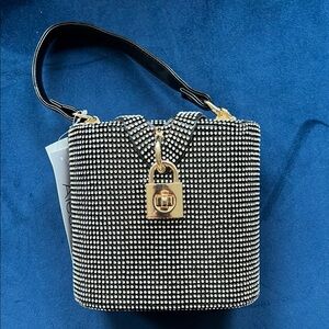 Elegant Black and Gold Women's Bag with crystal accents